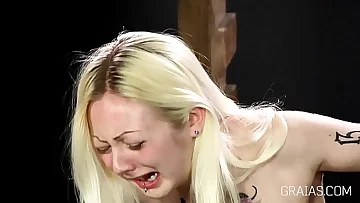 Caning the blonde girl