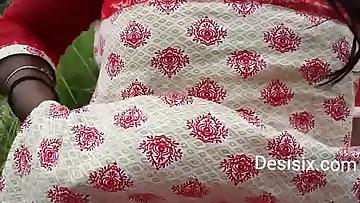 Desi lady showcasing cupcakes in park